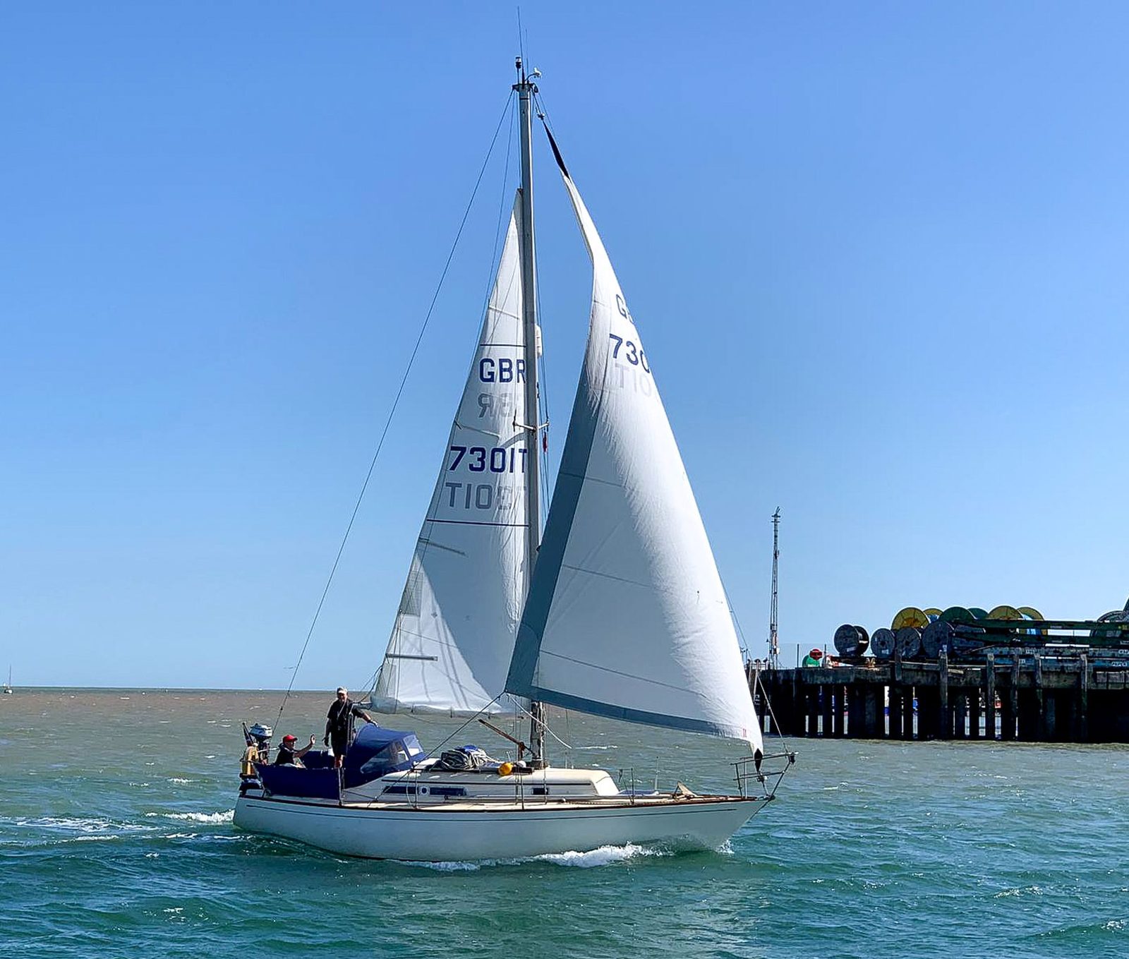 A club cruiser under full sail heeling in a fresh breeze in the Thames estuary
